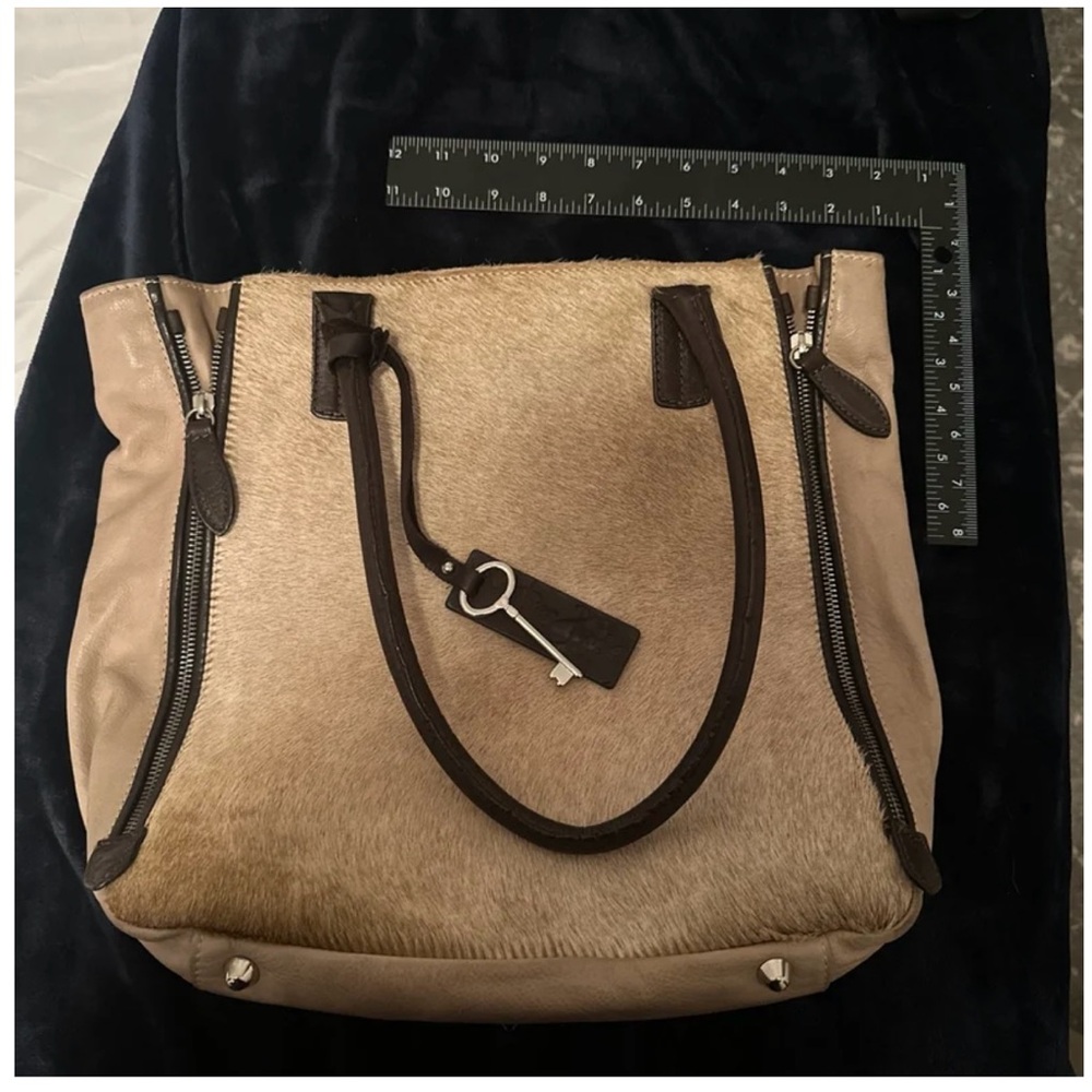 Amber Rose leather and real fur bag